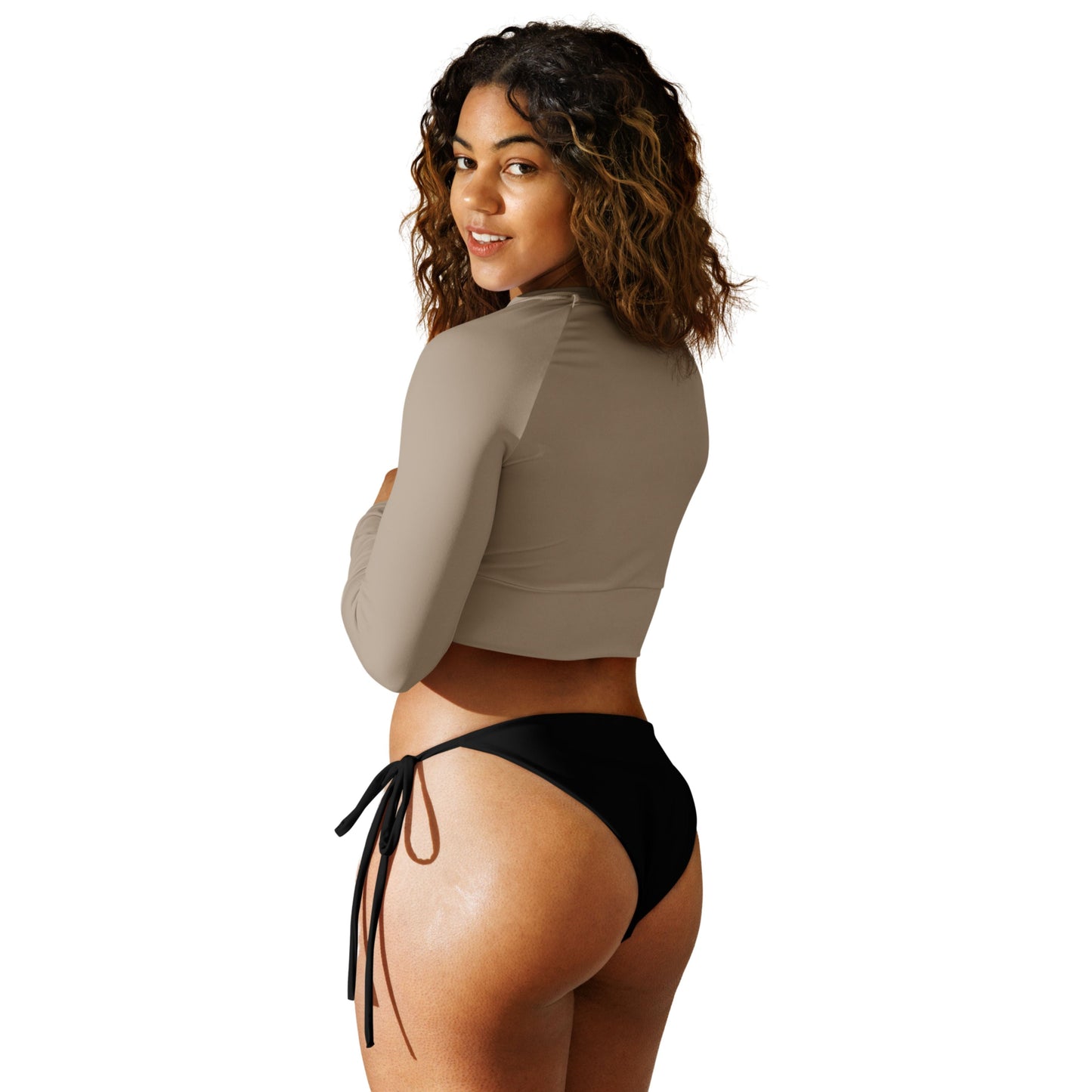 Woman in an aisoi String Bikini Bottom | True Black